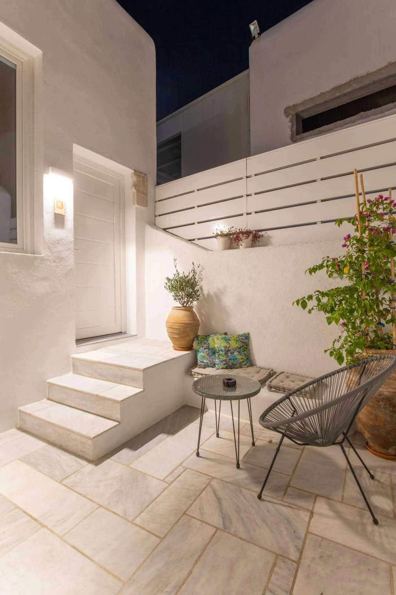 Steps up to a suite terrace in the evening